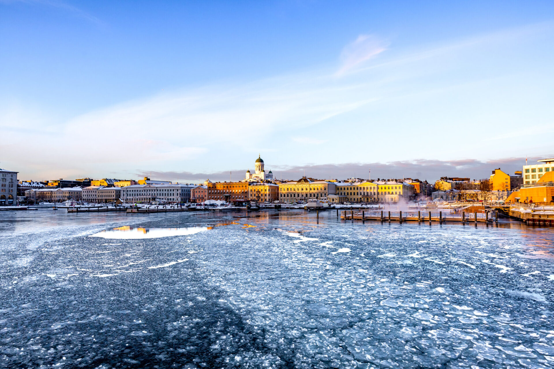 Cityscape of Helsinki with Cathedral, South Harbor and Market Square in winter.